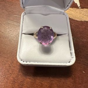 Light colored 4 Carat Tanzanite ring in sterling silver Setting.